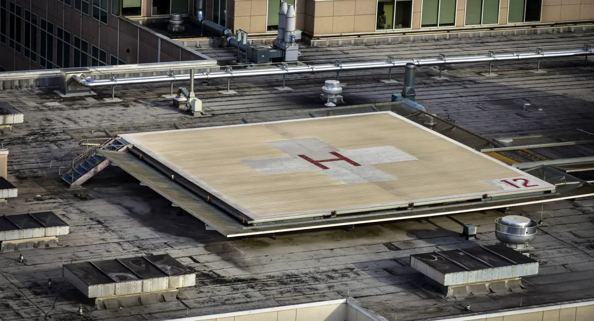 Rooftop helipad on a medical building, highlighting overlooked exterior areas vulnerable to pest activity in healthcare facilities