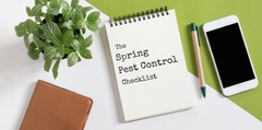 A notepad with the words "The spring pest control checklist" on it.