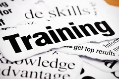 Cutouts of words from magazines including "Training, Skills and Knowledge"